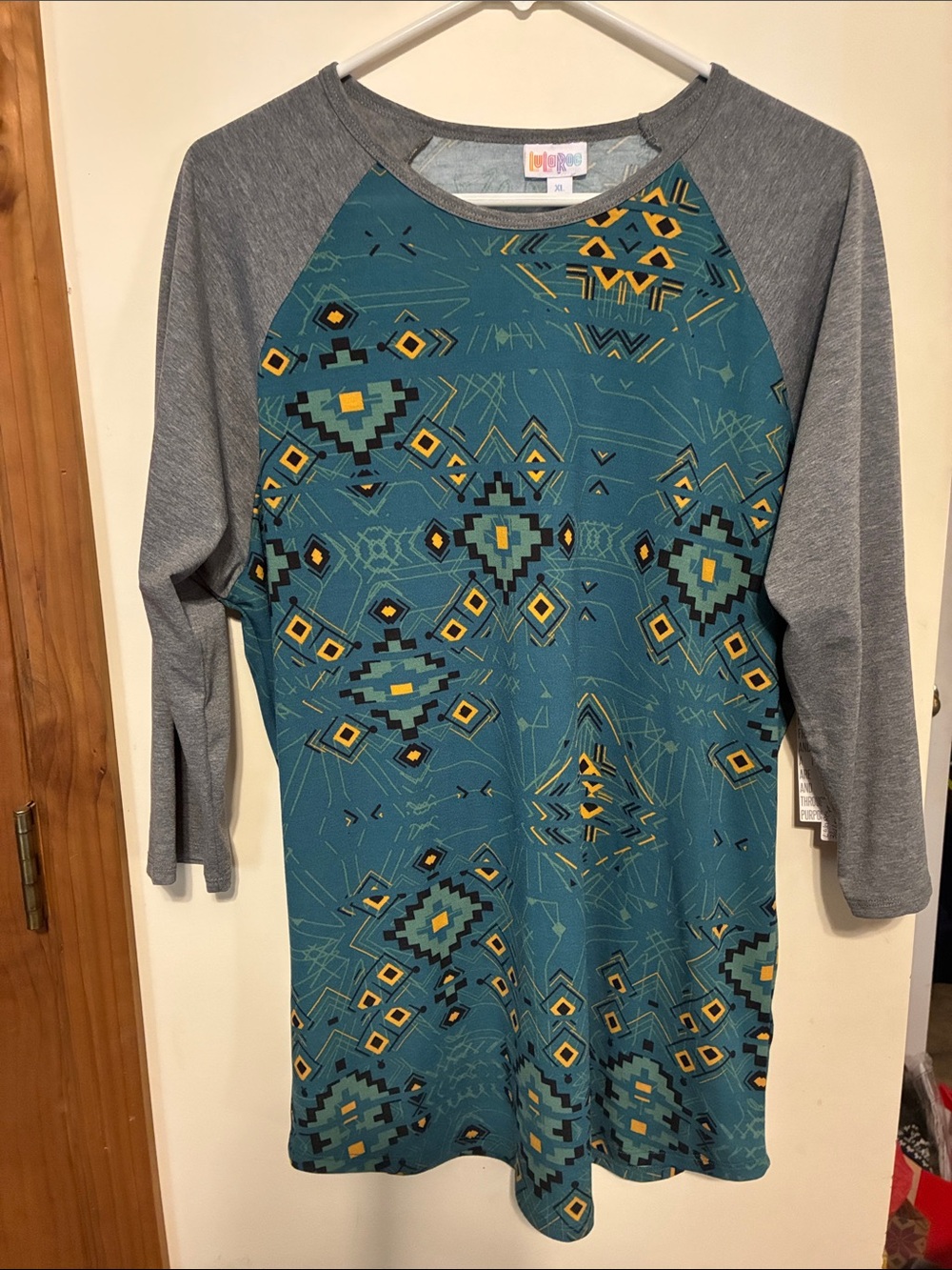 LuLaRoe Teal Geometric Raglan Kids Top with Gray Sleeves